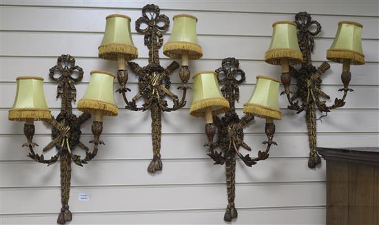 A set of four Victorian gilt gesso wall lights, H.66cm
